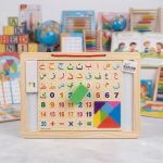 Wooden educational board with multiple activities for children